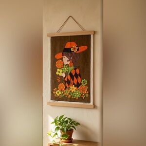 Vintage Floral Wall Hanging with Orange and Brown Accents
